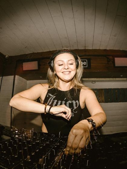 A happy, smiling shot of me behind the decks at Summer House in Delhi. It was a really fun night.