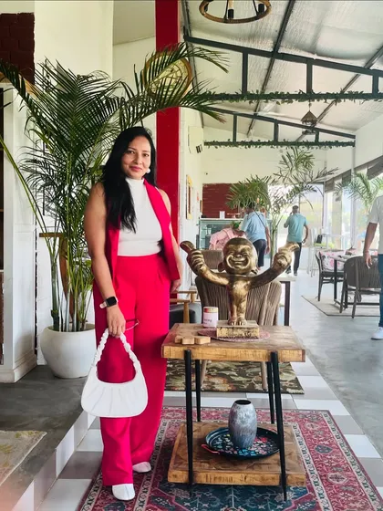 Posing inside our beautifully decorated cafe. The stylish interiors provide a perfect backdrop for your photos.