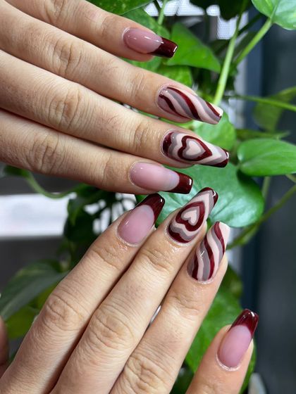 A beautiful set of latte art nails with a heart design, created by a student from our March batch. This shows the long-lasting skill and creativity they develop.