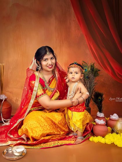 A classic portrait of mother and son in their beautiful traditional attire for our Maiyya and Kanha themed photoshoot.