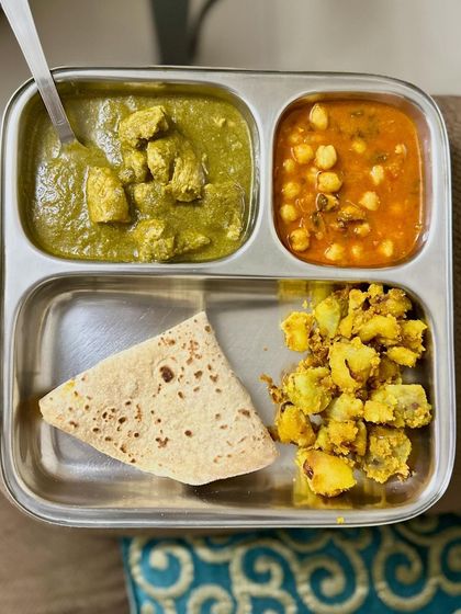 Another look at the delicious double-protein meal of chapati, chicken palak, chana masala, and sautéed potato.