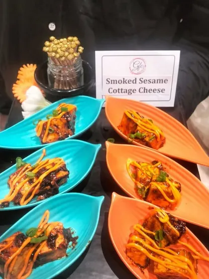Smoked sesame cottage cheese served in colorful, leaf-shaped dishes. We believe presentation is just as important as taste.