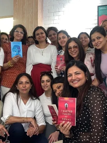 A happy group photo with author Smita Das Jain. Our members were thrilled to hold up their copies of "Twisted Tales and Turns" after an engaging and thought-provoking discussion.