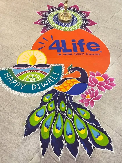 For corporate Diwali events, I integrate company branding directly into the festive art. This large-scale floor rangoli for 4Life features their logo alongside a vibrant peacock and lotus motifs, creating a welcoming and professional atmosphere.