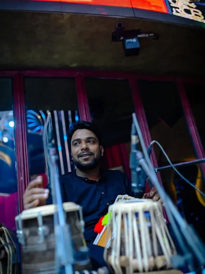 Our skilled tabla player, providing the intricate and classic rhythms that are fundamental to our Sufi and ghazal compositions.