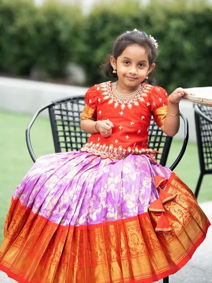 A picture-perfect moment in a custom Kanchi Pattu lehenga. I always ensure my outfits are comfortable enough for kids to sit and play in.