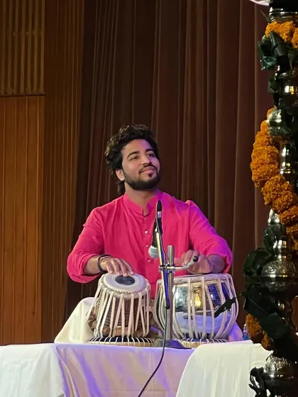 In the rhythm of the tabla, I find my story. A moment from another stage, another musical journey.