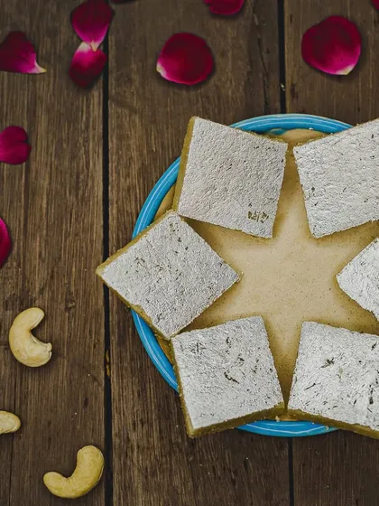A timeless classic, our Kaju Katli is made with premium cashews and just the right amount of sweetness. Each diamond is topped with silver varq, making it a perfect treat for any occasion, especially Raksha Bandhan.
