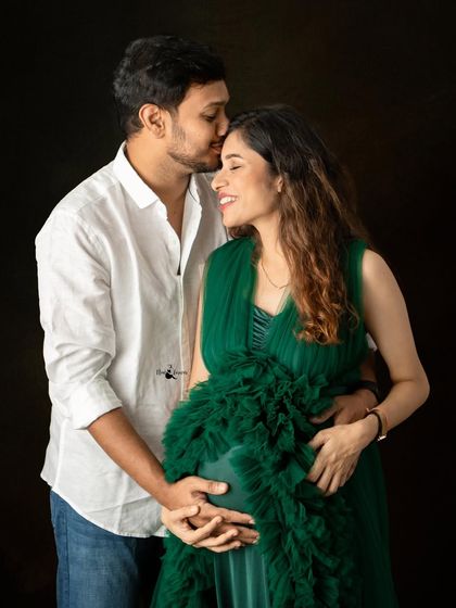 A sweet forehead kiss is a classic for a reason. It’s a simple, powerful expression of love and protection that I love to capture for expecting parents.