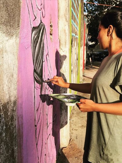 Here are some moments from the creation of the 'Stories of Water' mural. It started with awkward introductions and ended with a community of strangers and friends painting together, sharing stories, and bringing color and conversation to a public space.