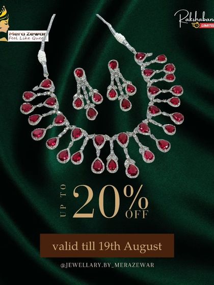 Here is the dangling stone necklace set in a passionate ruby red. It's a glamorous choice for weddings, receptions, or a special date night.