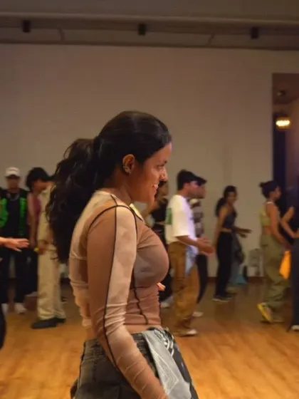 A student enjoying the 'Move Your Body' workshop. This class is a high-energy fusion of Bollywood and urban styles, perfect for a cardio blast.