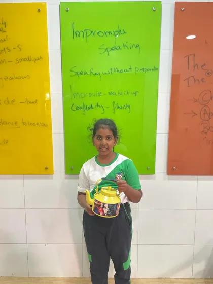 A kettle becomes the topic for an impromptu speech. We teach students that inspiration is everywhere, and the challenge of speaking about an unusual object builds mental agility and fluency.