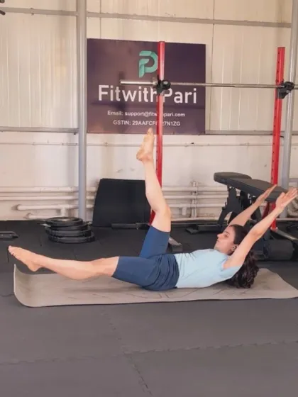 The single leg stretch is another classic Pilates mat exercise that targets the abdominals and improves coordination.