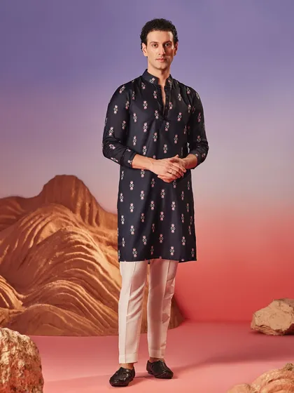 This dark navy printed kurta is a sophisticated choice for an evening celebration. The subtle all over pattern adds character without being overpowering.