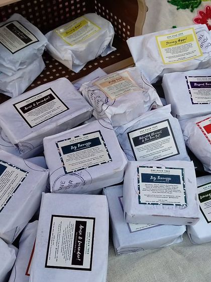 Soaps all wrapped and ready to go. I hand-wrap each bar in simple, eco-friendly paper with a clear label detailing the ingredients.