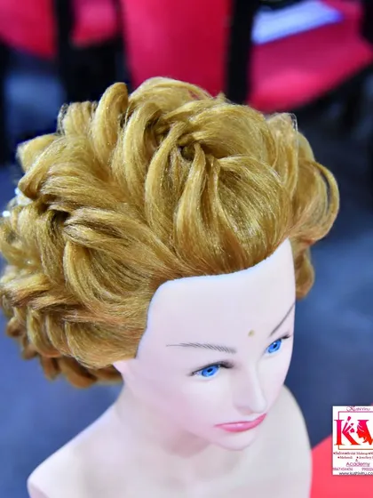 In my advanced hairstyling classes, you will learn to create complex, international styles like this one. We practice these techniques until you can do them perfectly for any event or client.