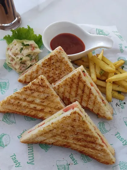 A close-up of our perfectly grilled sandwiches, a comforting and popular choice for any event.