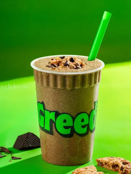 A chocolate chip cookie shake, garnished with cookie crumbles, from Greed Coffee.