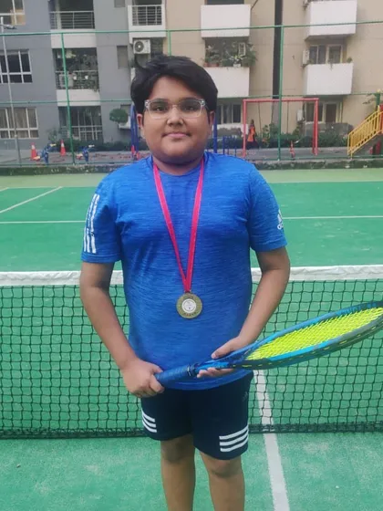 Dedication pays off. A big congratulations to Akshat Mann for winning a medal in his school's tennis competition. It's great to see our players succeed and represent their schools.