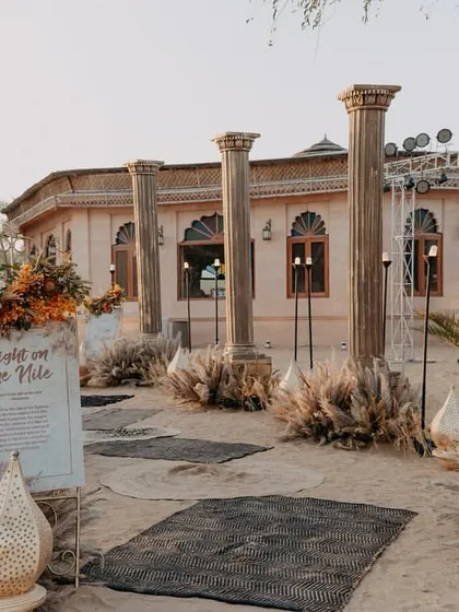 This "Night on the Nile" Sangeet was inspired by the couple's travels to Egypt. We transformed the desert dunes with Egyptian-style pillars and decor, creating a mystical and regal atmosphere for a night of dancing under the stars.