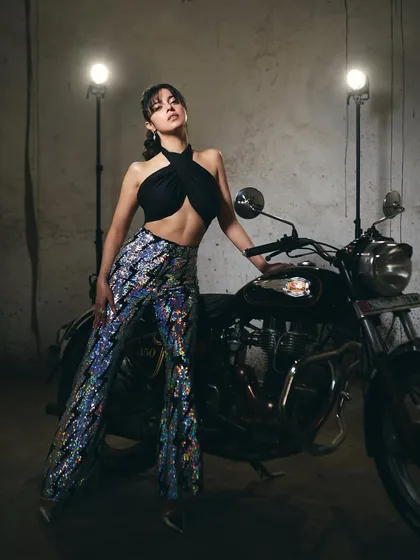 This series of shots captures the full biker-chic look I created for Divya Khosla Kumar's 'Yaariyan 2' promotions. The sequined jacket and pants by Any Old Iron paired with a simple black top created a cool, modern promotional style.