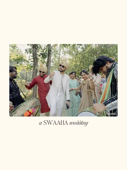 The groom dancing with his baraat, surrounded by dhol players, capturing the high energy of the procession.