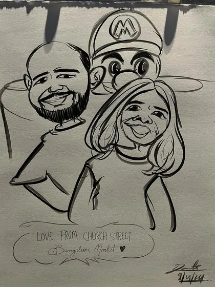 A duplicate of the Mario-themed couple's caricature.