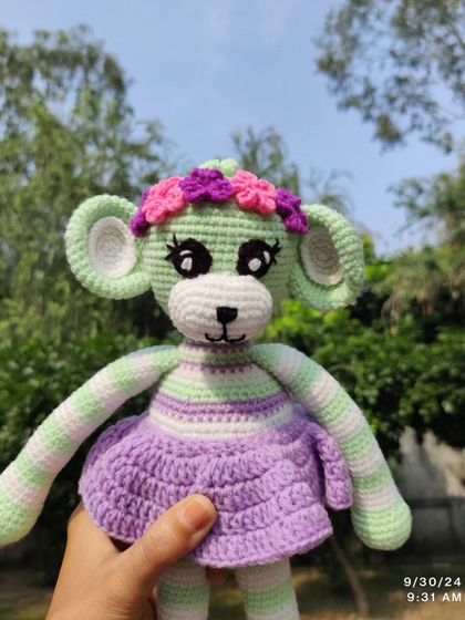 Another angle of the sweet, custom-made monkey doll.