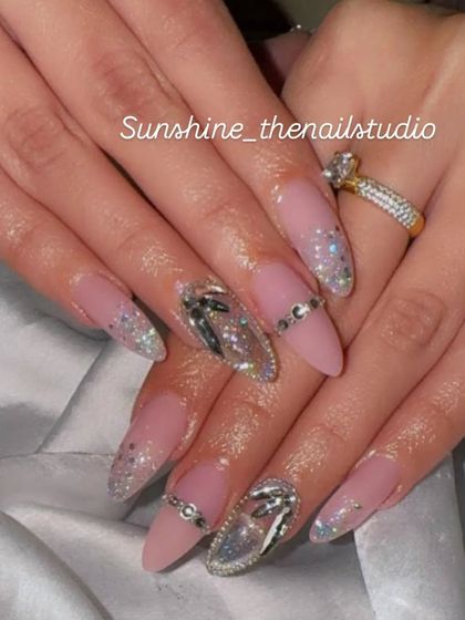 A glamorous pink set with glitter, crystals, and chrome accents.
