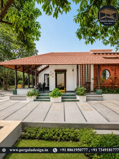 A front view of a traditional home with a tiled-roof veranda. The design creates a classic and welcoming facade, offering a comfortable space to sit and enjoy the outdoors.