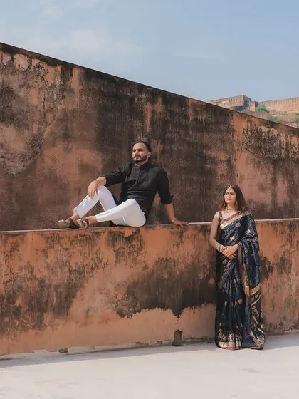 A destination pre-wedding shoot at a historic fort in Rajasthan. I use grand architecture as a backdrop to create a sense of timeless romance, perfect for couples who want their story told in a special location.