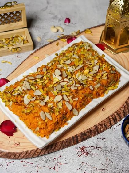 Our Ramadan Premium Iftar Box features irresistible desserts like this Gajar Halwa, richly garnished with almonds and pistachios.