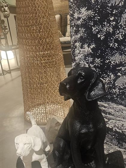 We even have decor for animal lovers, like these charming dog sculptures.