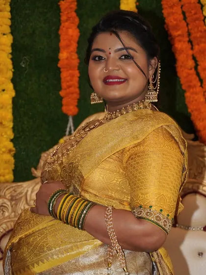 A gorgeous mom-to-be at her baby shower. I created a classic look with a bold red lip and softly defined eyes to match the festive and traditional theme of the event.