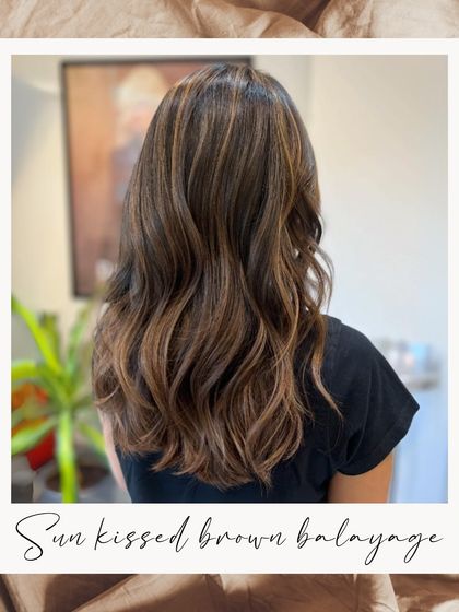 Embrace the glow with a stunning Sun-Kissed Brown Balayage. This colour mimics the natural highlights you'd get from a summer spent outdoors.