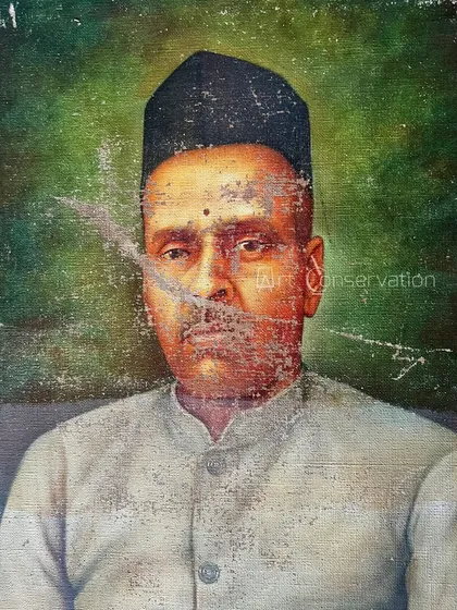 An example of a common problem I fix. This antique portrait from 1935 arrived at my studio with significant scratches and paint loss obscuring the face, a typical starting point for my restoration projects.