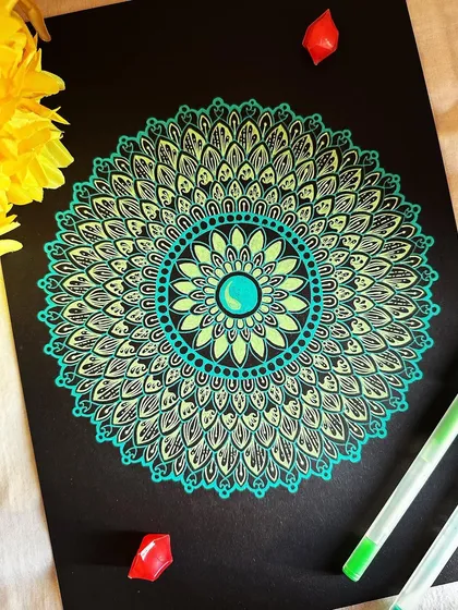 Creating with Gelly Roll pens on black paper feels like making magic. The way the colors pop is just incredible, and it’s a favorite technique for many of my students looking to try something different.