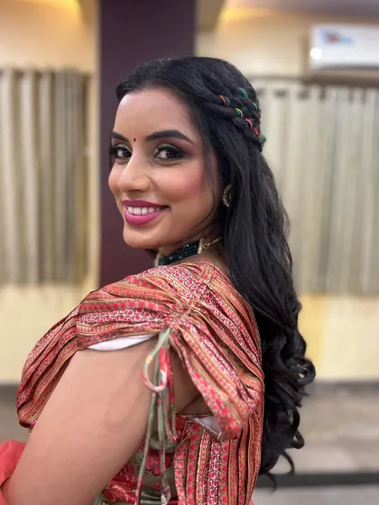 This Mehendi bride is glowing. The powerful makeup look was designed to be as memorable and vibrant as the celebration itself.