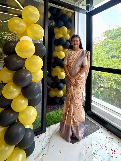 Standing proud in our newly opened studio. The decorations and festive atmosphere marked the start of our journey to bring dance and yoga to the community.