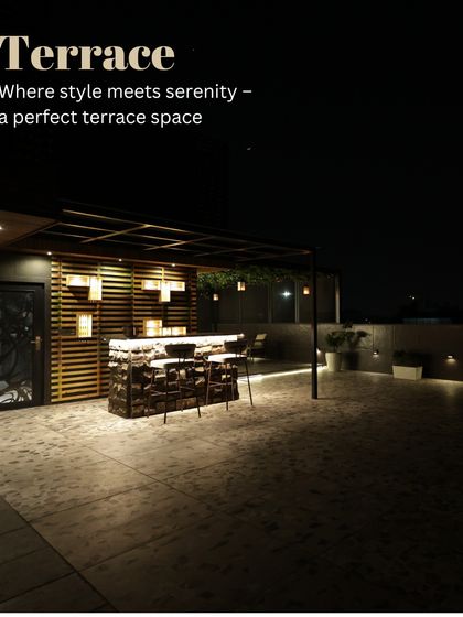 This terrace is where style meets serenity. I designed this rooftop space with a custom bar, subtle floor lighting, and a slatted wood screen to create the perfect oasis for relaxing or entertaining at night.