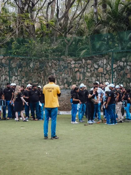 My adventure team instructor setting up a game for a corporate group, ensuring everything is safe, fun, and well-organized.