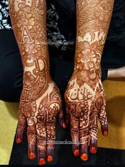 A full bridal design with the names 'Adil' and 'Aila' written in elegant script.