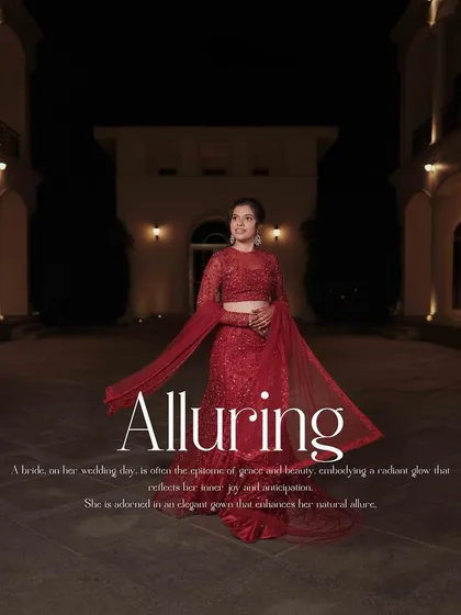 A bride, radiant in her red reception gown, stands as a symbol of grace and anticipation. My goal with cinematic portraits like this is to create a timeless image that feels like a still from a beautiful film.