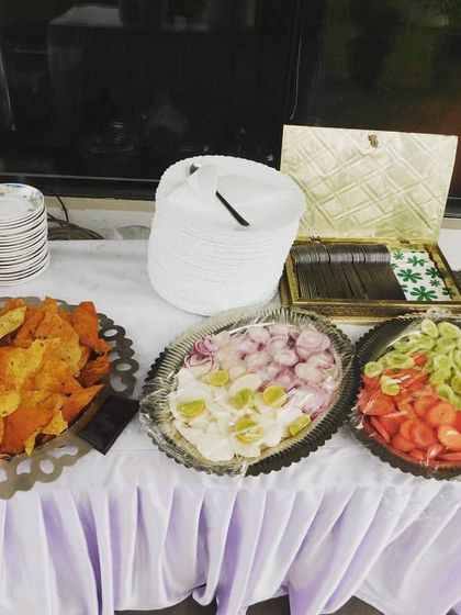 A simple salad and papad station, ensuring guests have fresh and crunchy accompaniments to their main meal.