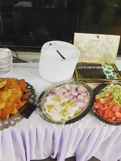 A simple salad and papad station, ensuring guests have fresh and crunchy accompaniments to their main meal.
