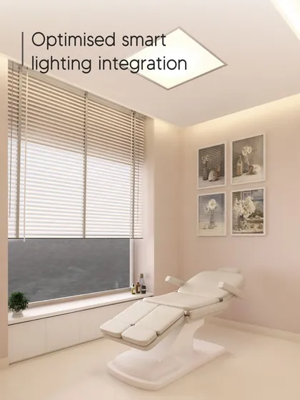Optimized smart lighting integration is another pillar of luxury wellness. This treatment room uses lighting that can be adjusted to enhance comfort and support the patient's circadian rhythms.