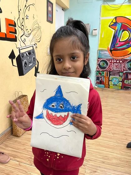 Another fantastic shark drawing from our sea creatures themed art class. It's wonderful to see each child's unique take on the same subject.