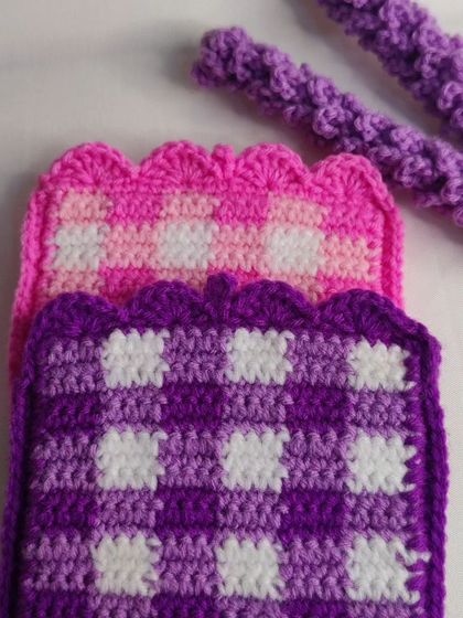 Cute and functional card holders. I've made them in various styles, including a pink camera design and a trendy gingham pattern in purple and pink.