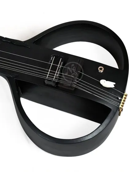 An angled view of the black electric sitar, showing its unique, open-frame construction.